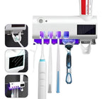 Porta cepillos de pared con luz UV y dispensador de pasta dental